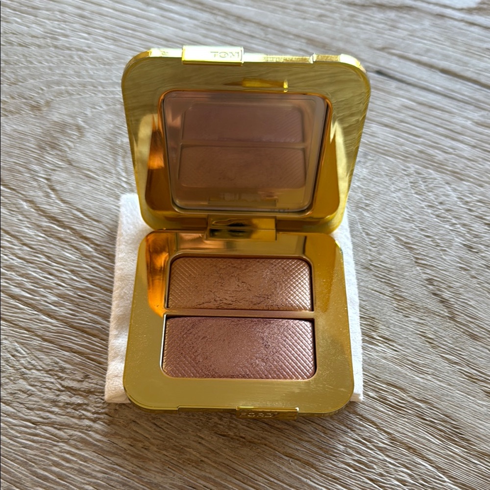 Tom Ford sheer highlighting duo in reflects gilt